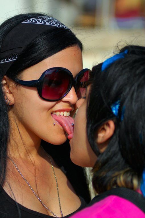 Sexy girls tongue kissing party