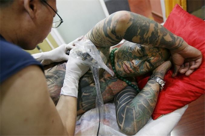 Любитель татуировок (7 фото)