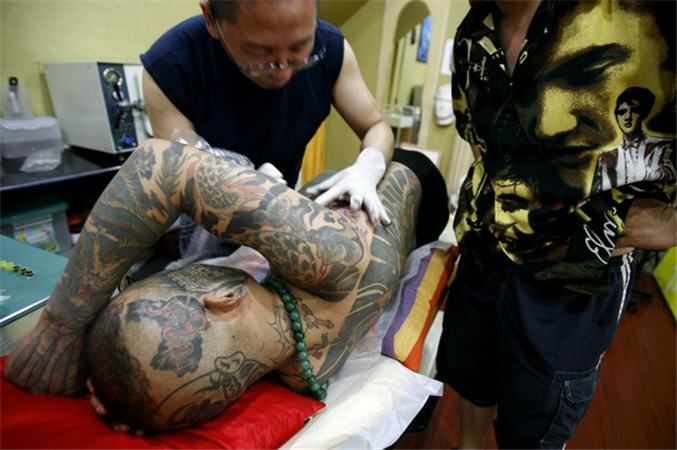Любитель татуировок (7 фото)