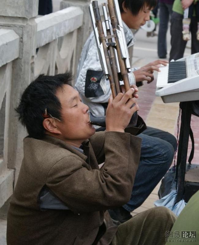 Китайский уличный оркестр (17 фото)