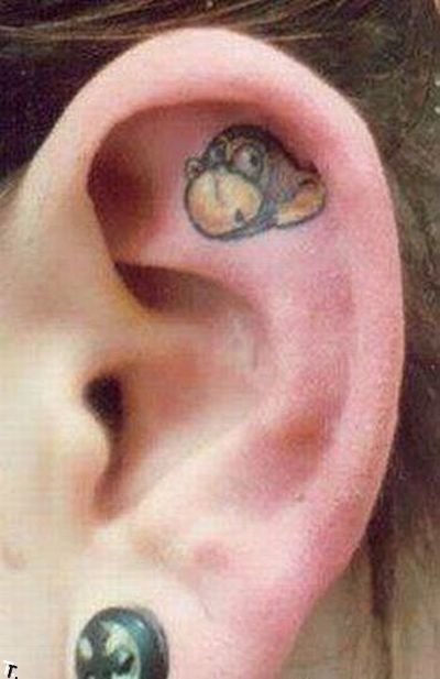 Татуировки в ушах (15 фото)