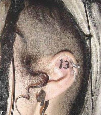 Татуировки в ушах (15 фото)