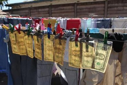 Отмывание денег по-зимбабвийски (5 фото)
