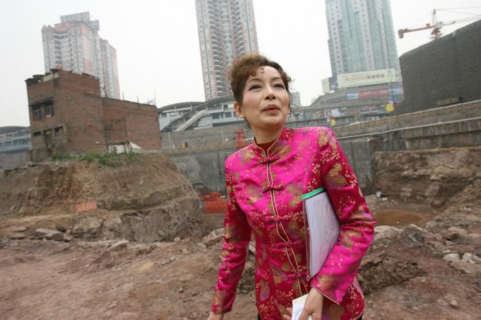 Упрямые домовладельцы из Китая (8 фото)