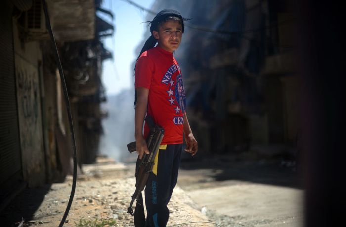 Suriye'de Savaşla Birlikte Yaşam(36 Fotograf)