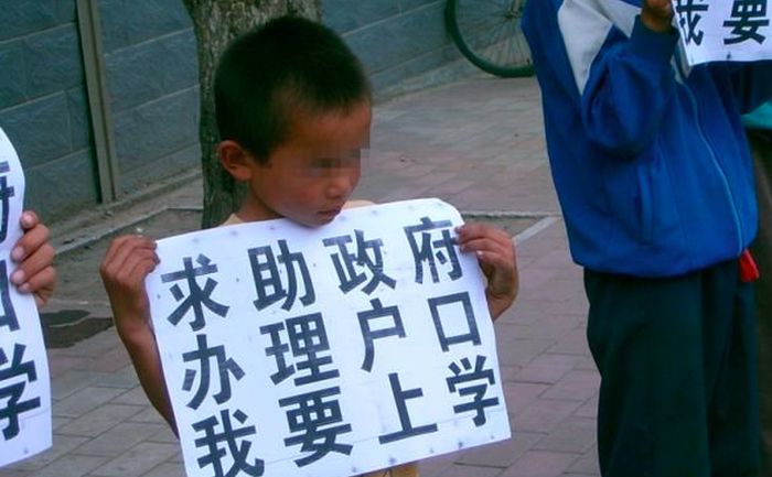 Люди-невидимки или «черное население» Китая (5 фото)