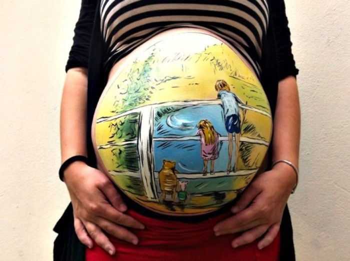 Оригинальное предложение руки и сердца и другие великолепные рисунки на животах беременных женщин (10 фото)