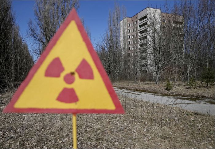 Зона отчуждения Чернобыльской АЭС спустя 30 лет после аварии (22 фото)