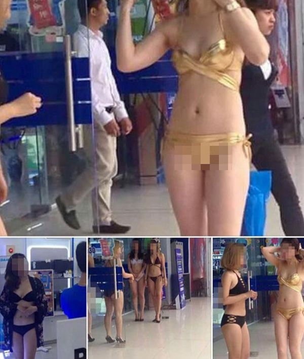 Во Вьетнаме продавщиц электроники одели в бикини (7 фото)