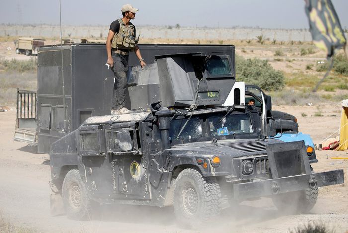 Иракская армия отбивает у «Исламского государства» город Эль-Фаллуджи (21 фото)