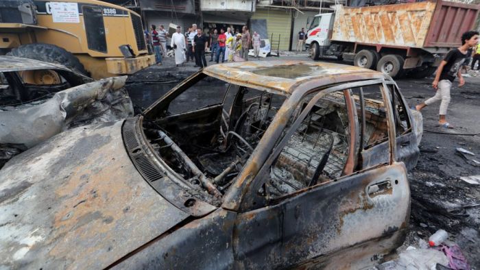 Более 170 человек погибли в результате двойного теракта в Багдаде (5 фото)