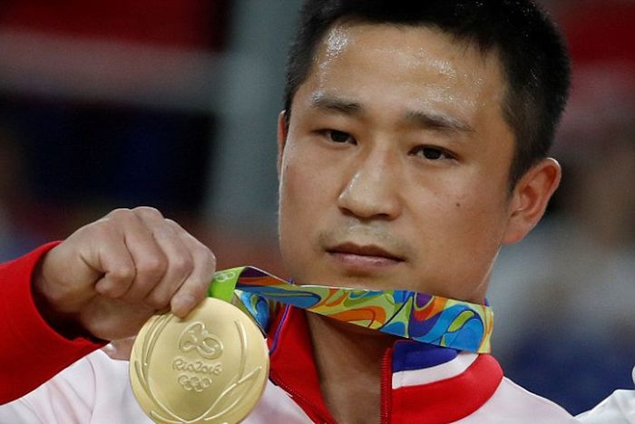 Северокореец Ли Сегван оказался самым грустным олимпийским чемпионом (4 фото)