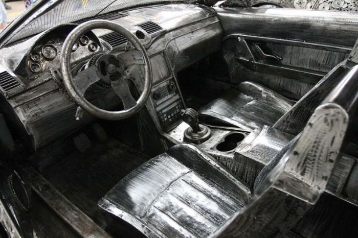 Автомобили, созданные из металлолома (9 фото)