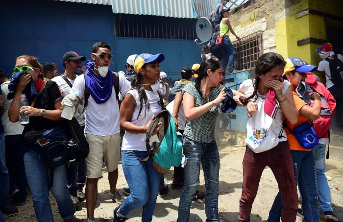 Массовые протесты и беспорядки в Венесуэле (42 фото)