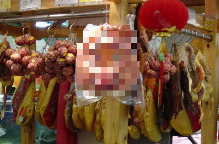 Как продают вяленые свиные головы в Китае (7 фото)