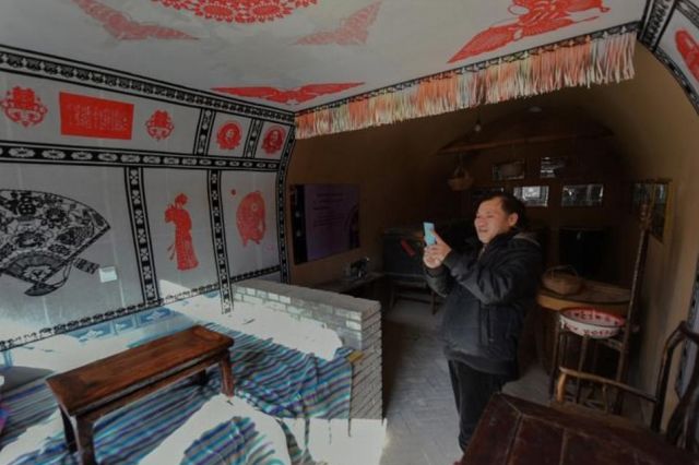 Подземные жилища китайцев (24 фото)
