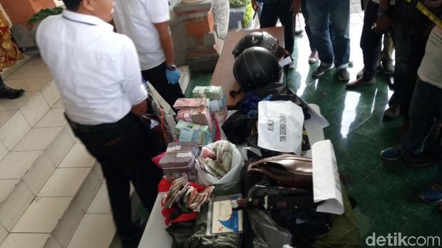 Во время перестрелки с полицией после ограбления обменного пункта на Бали был убит грабитель из России (4 фото)