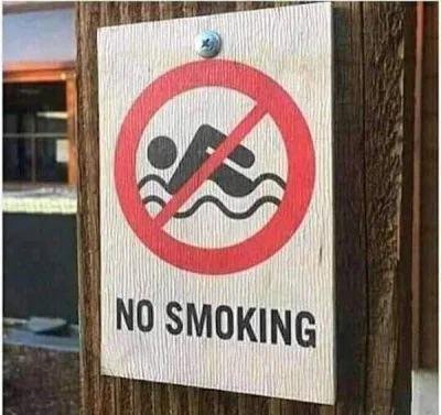 Кажется, что человек на знаке не курит…