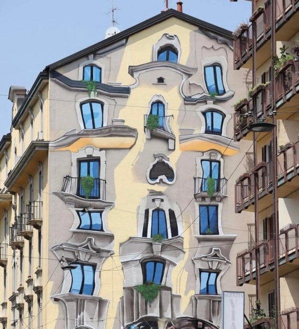 Настенные росписи в Милане от уличного художника Козимо Чеоне Каифа