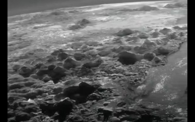 Вид на Плутон с зонда New Horizons