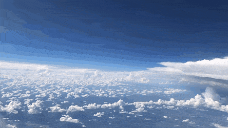 Облака через иллюминатор самолета