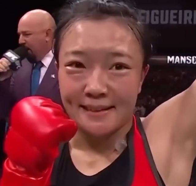 Ши Мин - китайская боец UFC, которая работает врачом